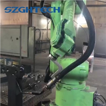 The Welding Robot Is Used Together With The Welding Fixture